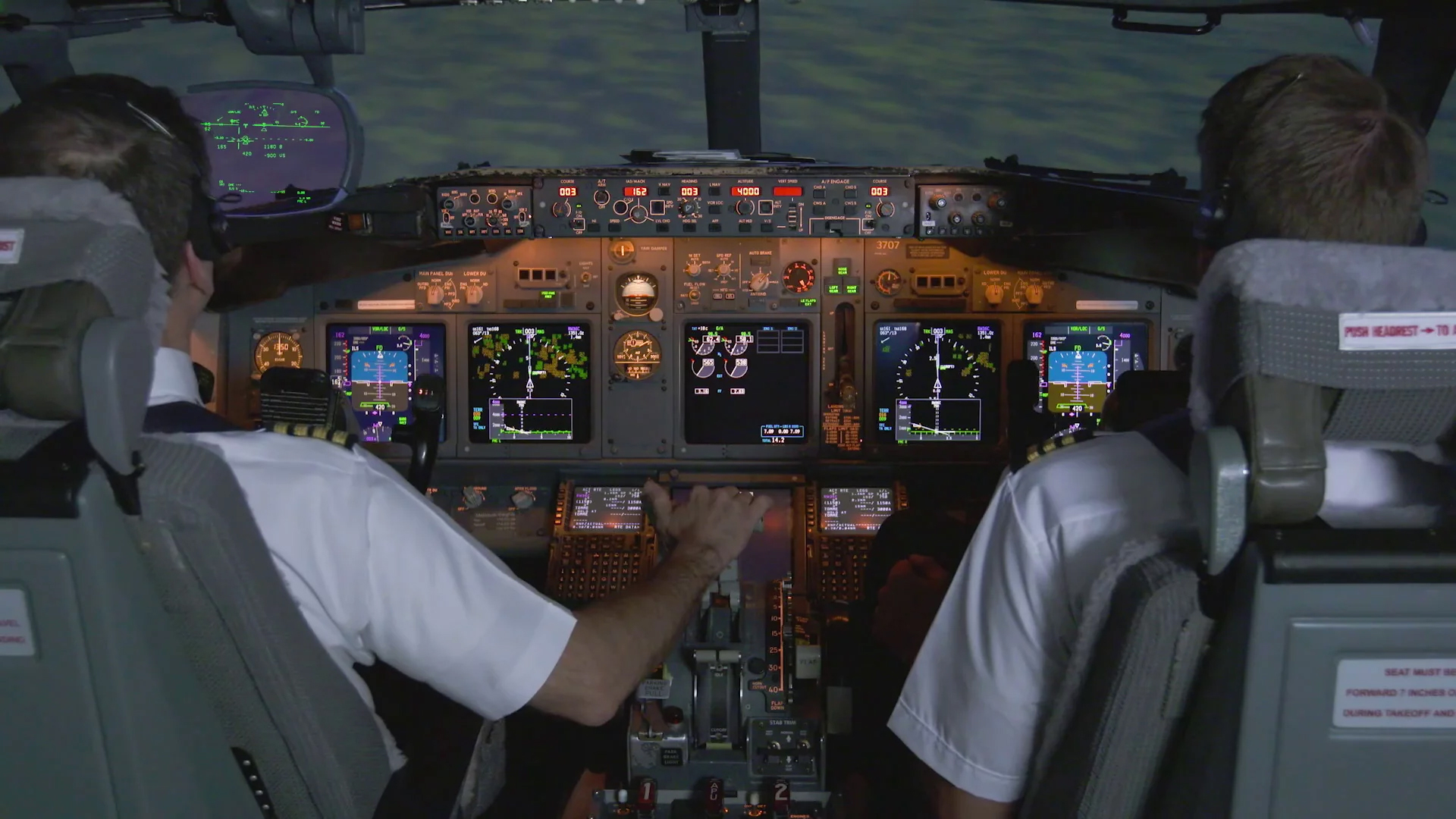 Delta eBrief Video Thumbnail of pilots in the cockpit